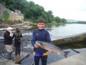 Jack Mc Quaid with his Salmon weighing 5.61lb caught on the worm